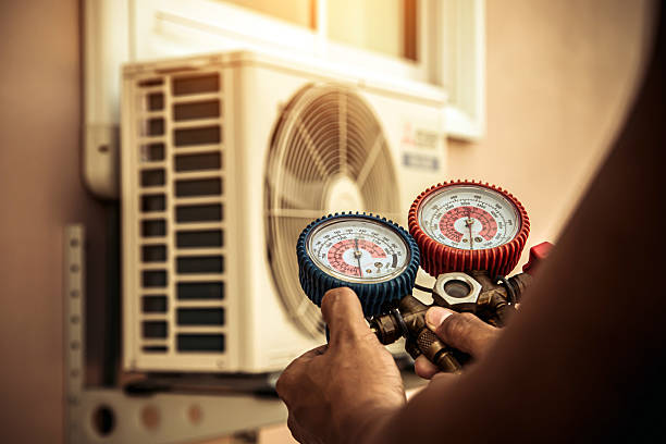 Professional Air Conditioning Service technician working in Gadsden, SC